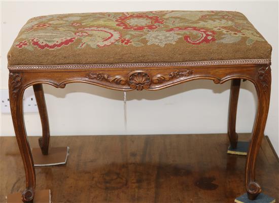 A Louis XV style carved beech stool with tapestry-upholstered seat W.66cm